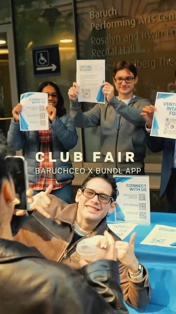 Members holding CEO flyers at the club fair with the Bundl app