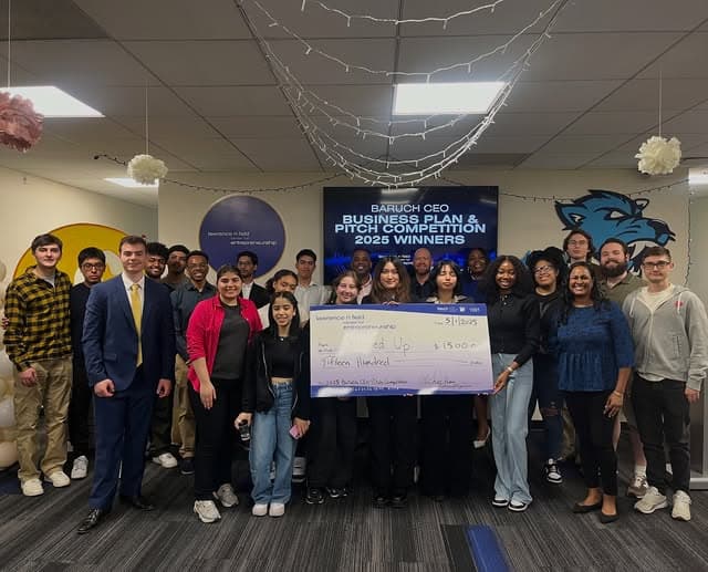 Popped Up holding the winning check at the 2025 CEO Pitch Competition